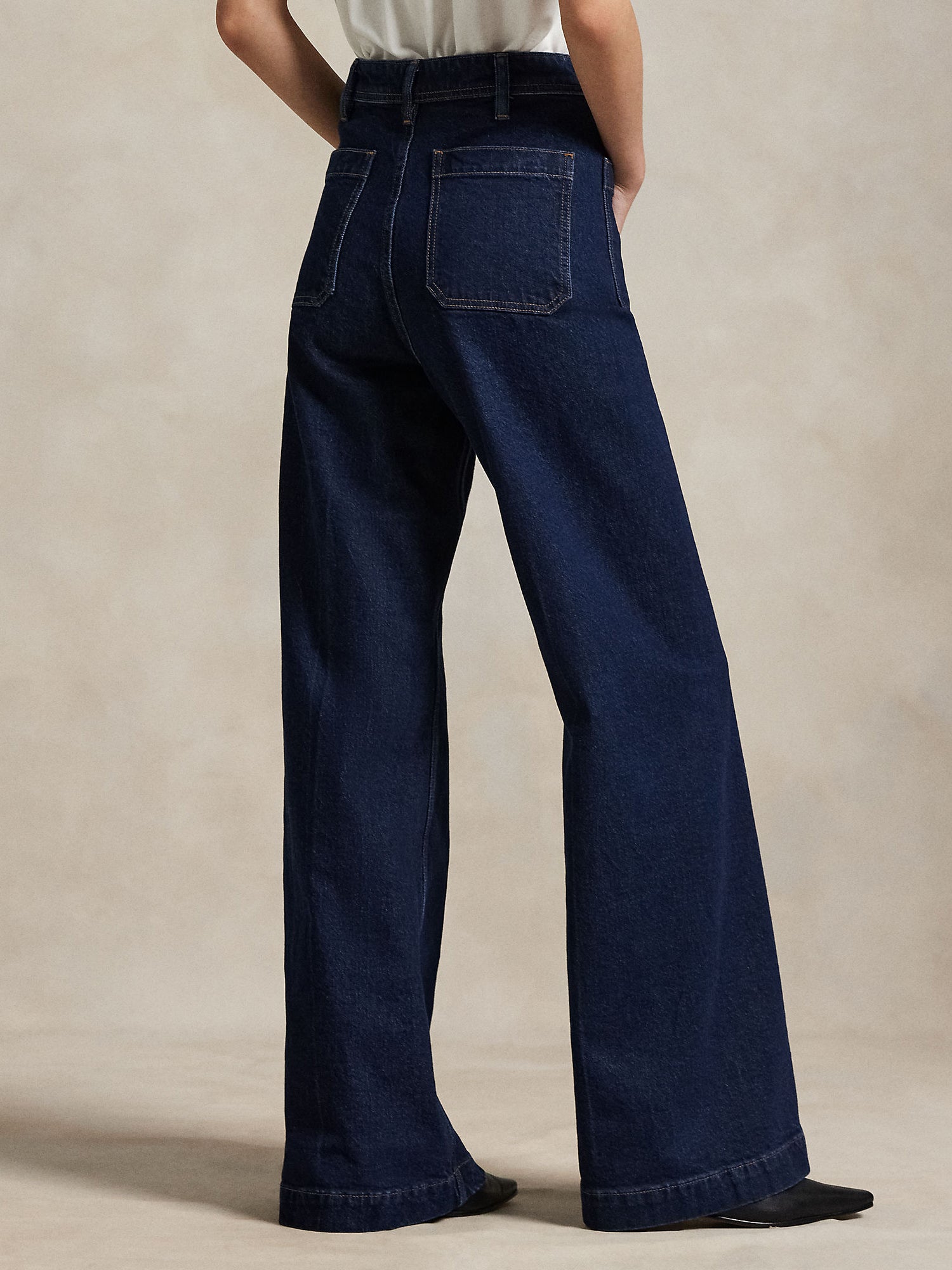 HIGH-RISE BOOT JEAN